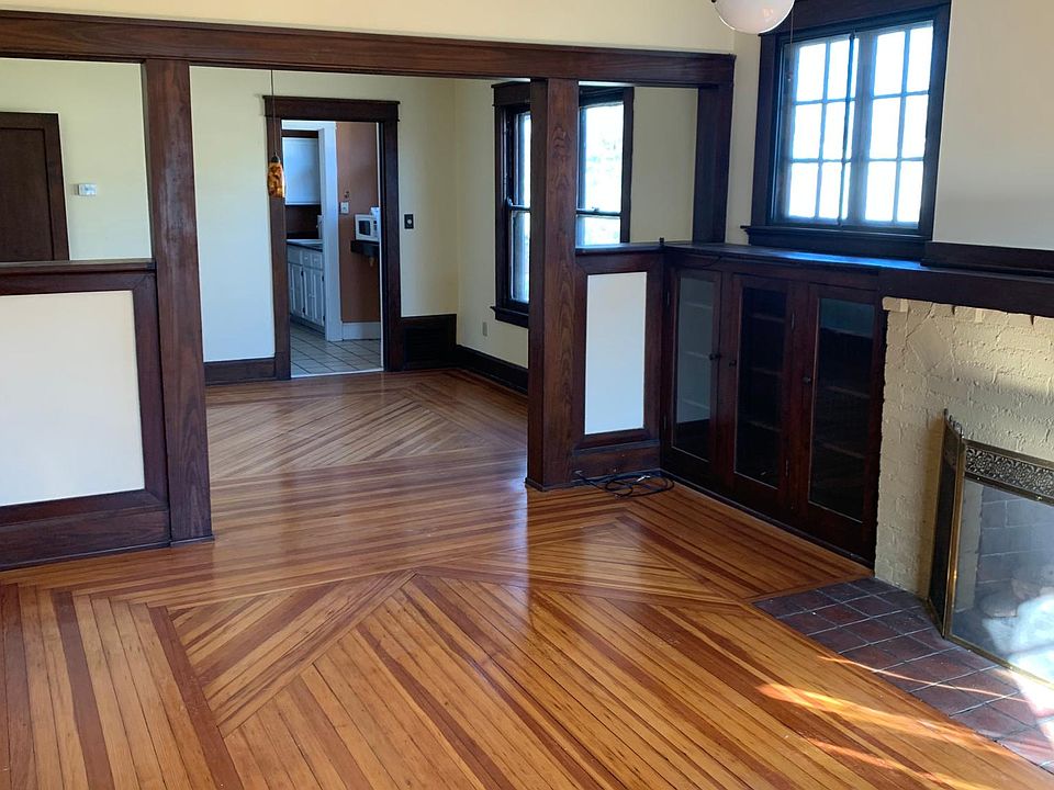 Living room looking towards dining room and pantry way to the kitchen.