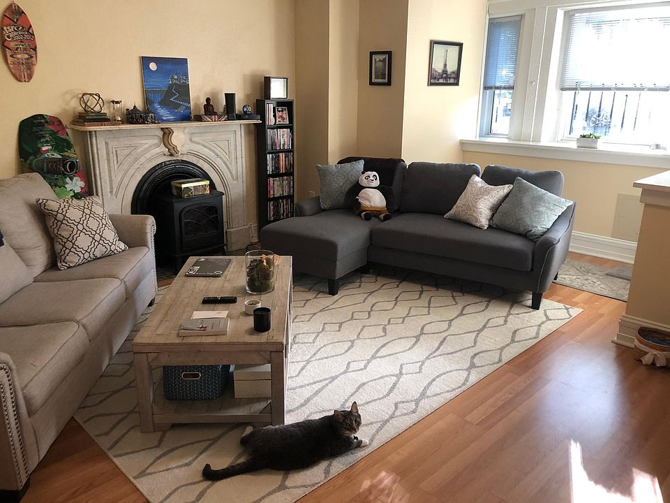 Living room w/ fireplace from entrance