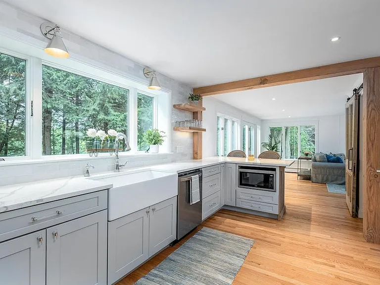Open concept kitchen/dining/living