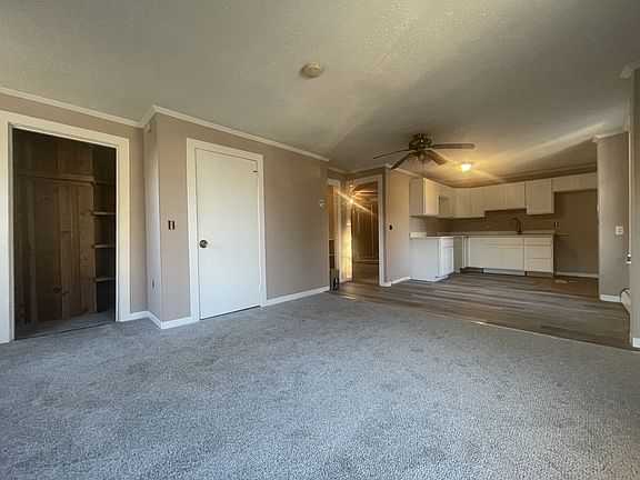 Living room with lots of closets