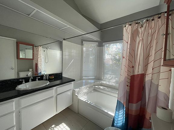 Large private bathroom with plenty of storage