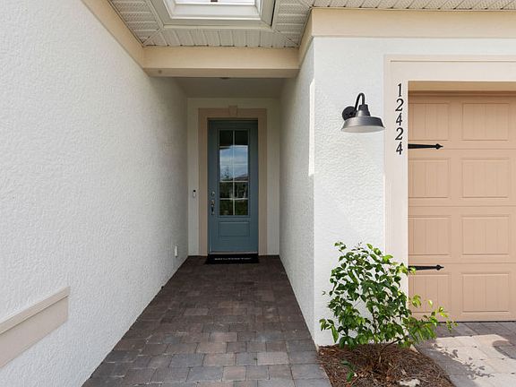 Welcoming Palmary Exterior with Impact Glass