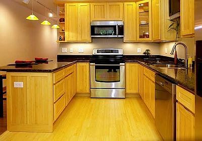 Updated Kitchen with Bamboo Cabinets and Flooring