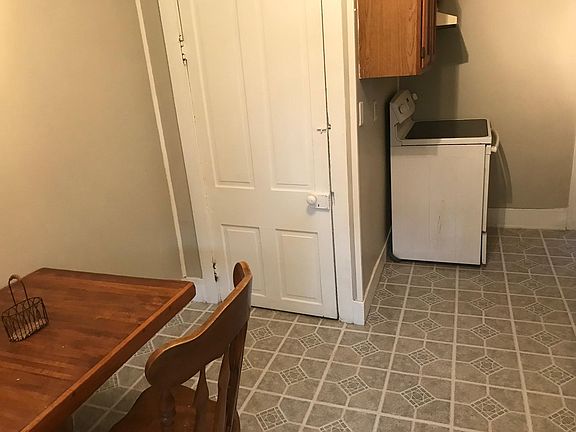 Kitchen and storage closet/basement entrance)