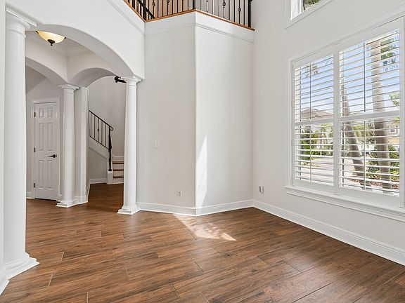 Formal Living Room with Extra High Ceiling