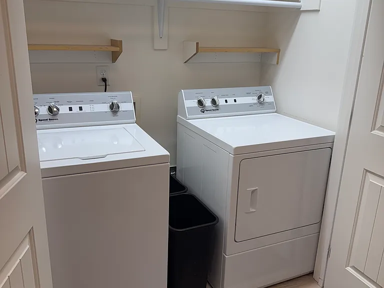 Washer/Dryer with hanging rod and dirty cloths bins