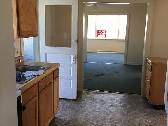 Kitchen looking into dining room and into livingroom