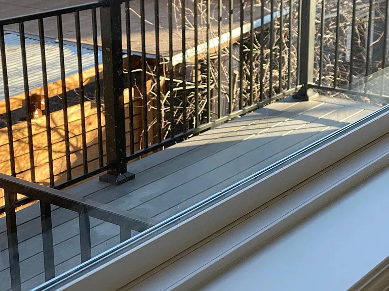 The private deck allows for outdoor dining and relaxing. A convenient water spigot makes it easy to have planters filled with color to add to a festive vibe. Outdoor electrical outlets allow for pretty lights and mellow summer nights.