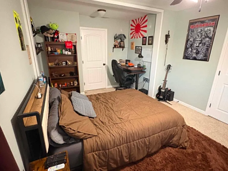 $750 Standard Bedroom - Shown furnished for size reference; rented unfurnished.