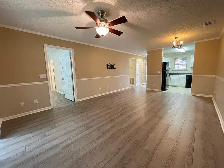 Open-concept living and dining area with lots of natural light