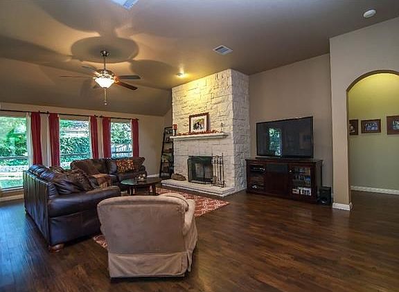 Large living area with beautiful fireplace with new rock!