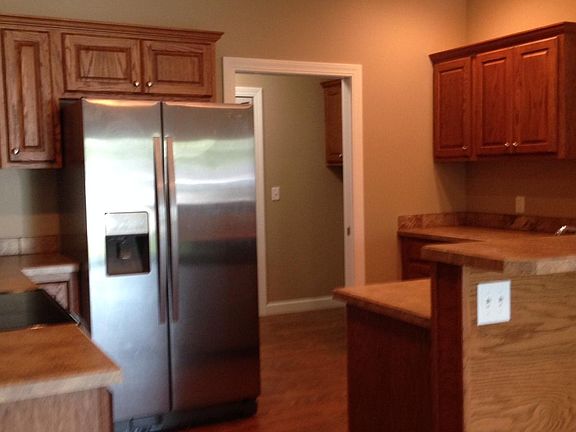 Easy access to Kitchen and Mudroom off garage