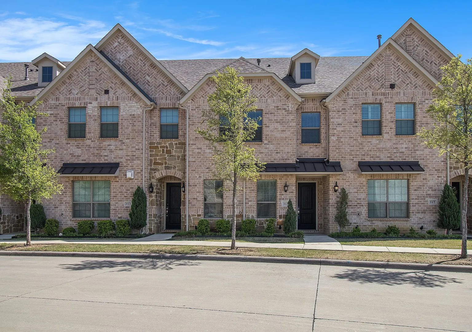 Convenience, Style, and Location - Windhaven Crossings Townhome — Photo 2