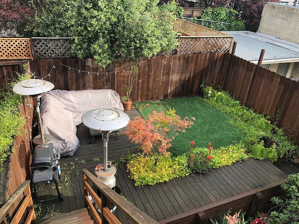 Sunny yard shared with one other unit.