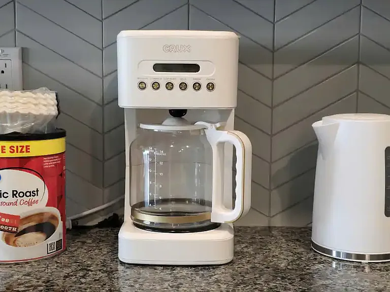 Kickstart your day with the convenience of our modern coffee maker.
