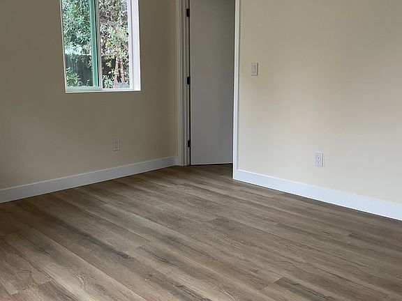 Open space living big enough for a working station as well as entertainment