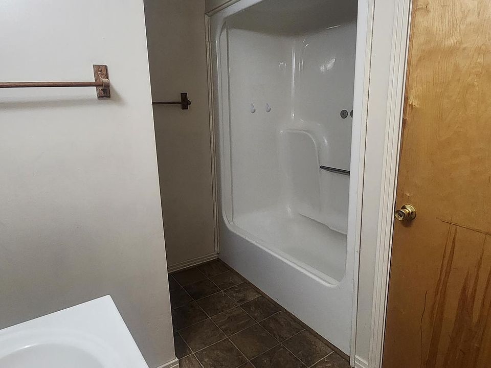 Bathroom with hidden toilet and spacious closet
