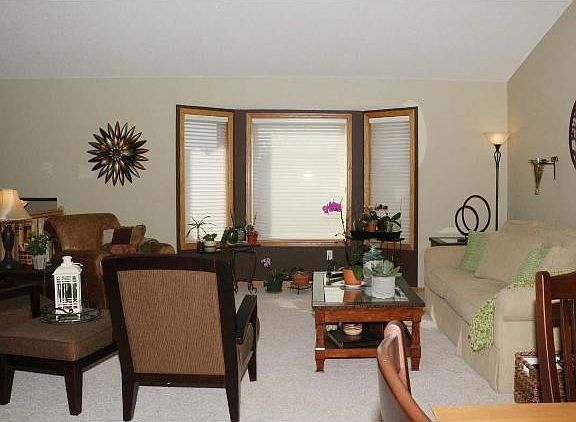 Large living room on the upper level is warm and inviting.