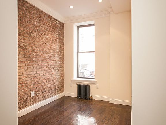 3rd image of 50 E 3rd St APT 1B