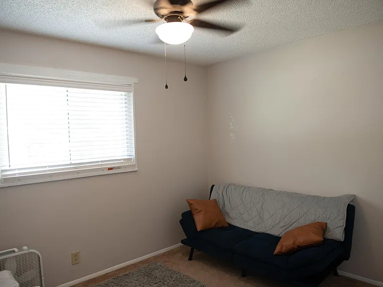 front bedroom with large double door closet (not pictured)