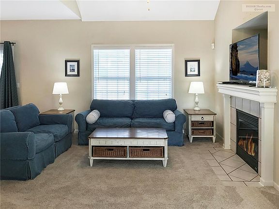 Fire in fireplace is simulated.