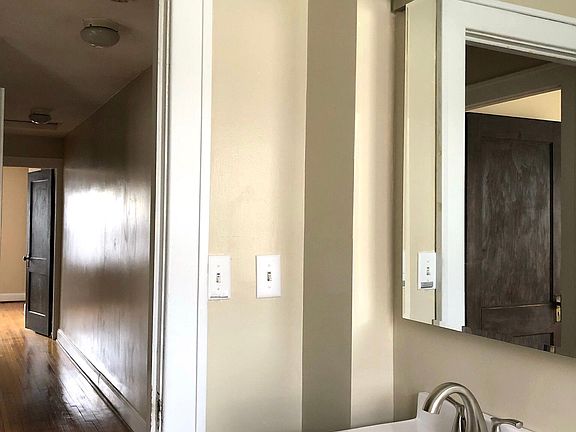Bathroom upstairs. Three bedrooms down the hallway.