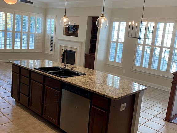 Open kitchen, eating nook, and family room.