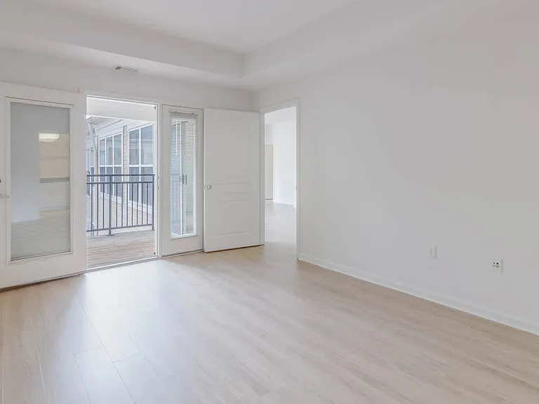 Bedroom with Balcony and Hard Surface Flooring