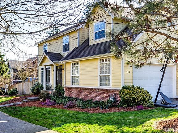 The corner lot is large and has mature landscaping.  