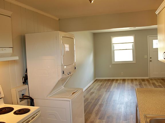 Washer/dryer combo included.