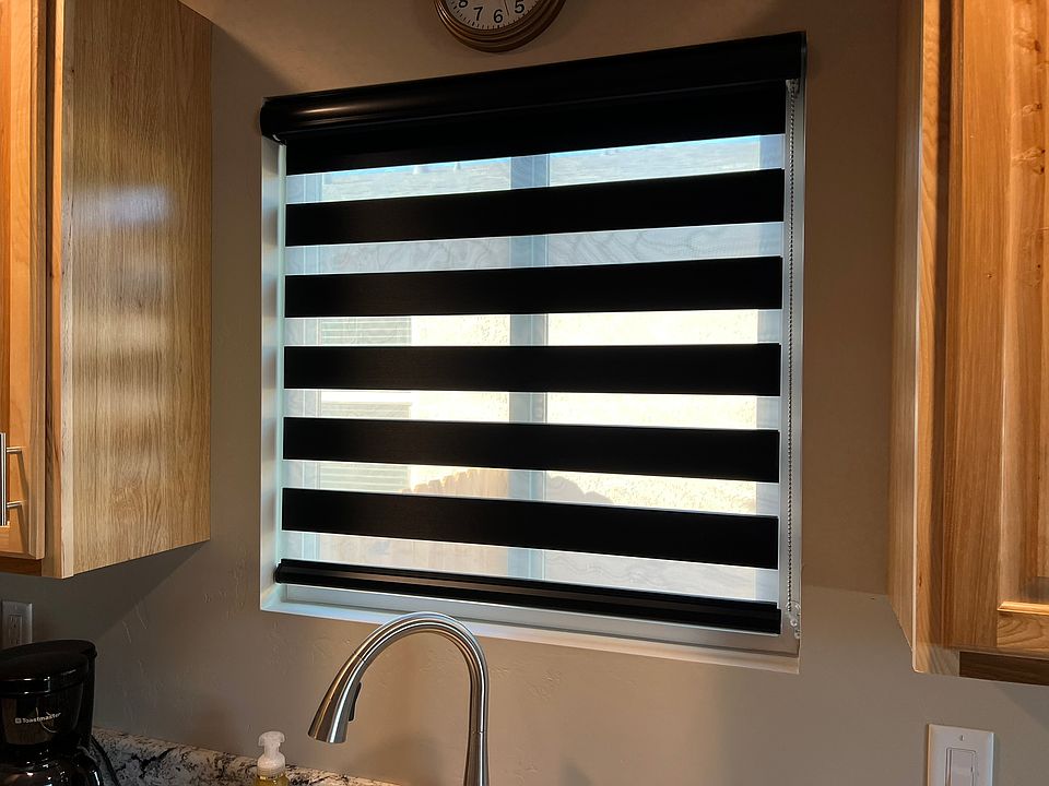 Zebra blinds can let in light and one way viewing or be room darkening.