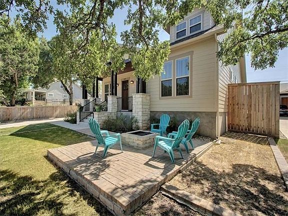 Outdoor fire pit is a great gathering place.