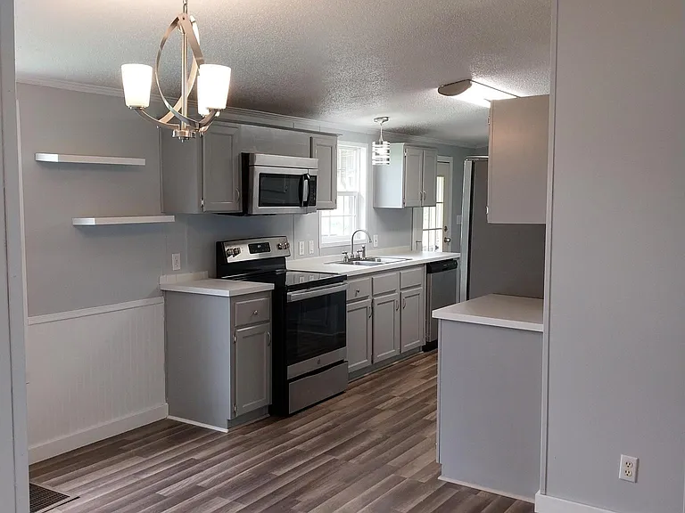 Dining room with view to kitchen