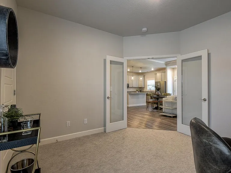 The Cardiff- Transitional Bedroom 3 - Has Glass Front French Doors That Open to the Great Room/Living Area