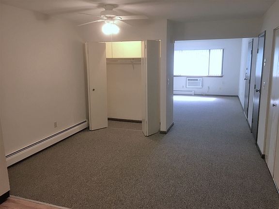 Dining Room looking into the Living Room and Extra Closet