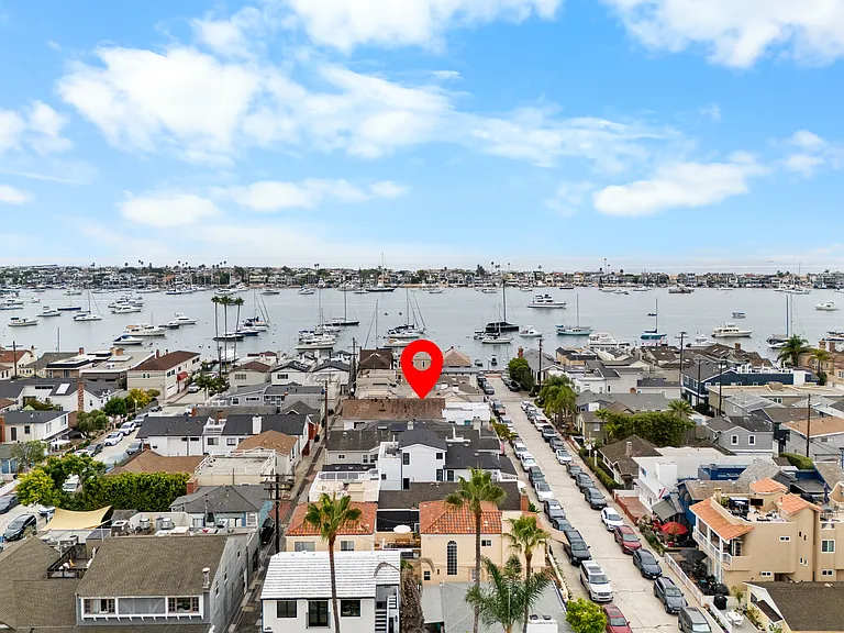 1 street over from Marine Ave (Marine has shops, restaurants, post office, and a grocery store)