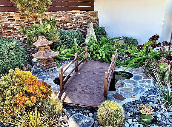 Small pond in front entry