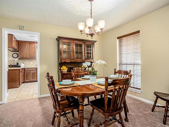 Formal dining room looking towards the kitchen