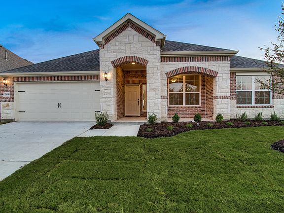 The Dunlay, a one-story home with 2-Car Garage, shown with Home Exterior C