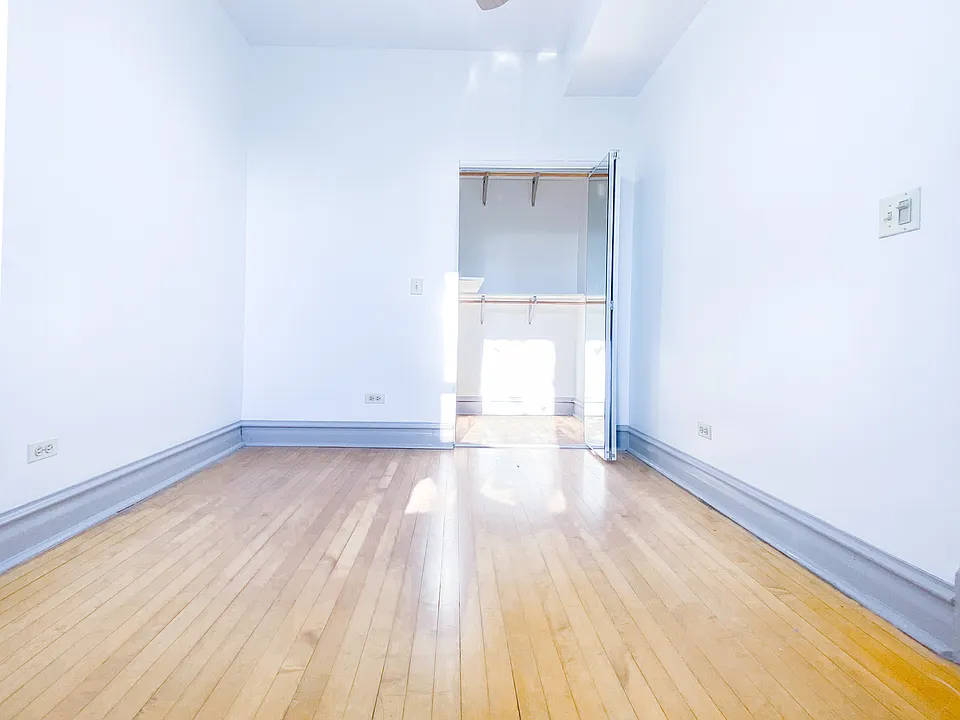 Rear Bedroom, approx 100 sq. ft.
with walk-in closet (with window)