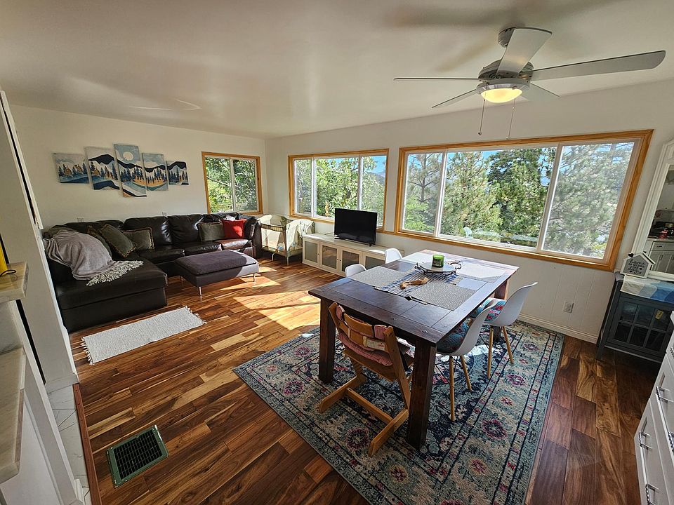 Papoose views in large dining room and living/lounge room.