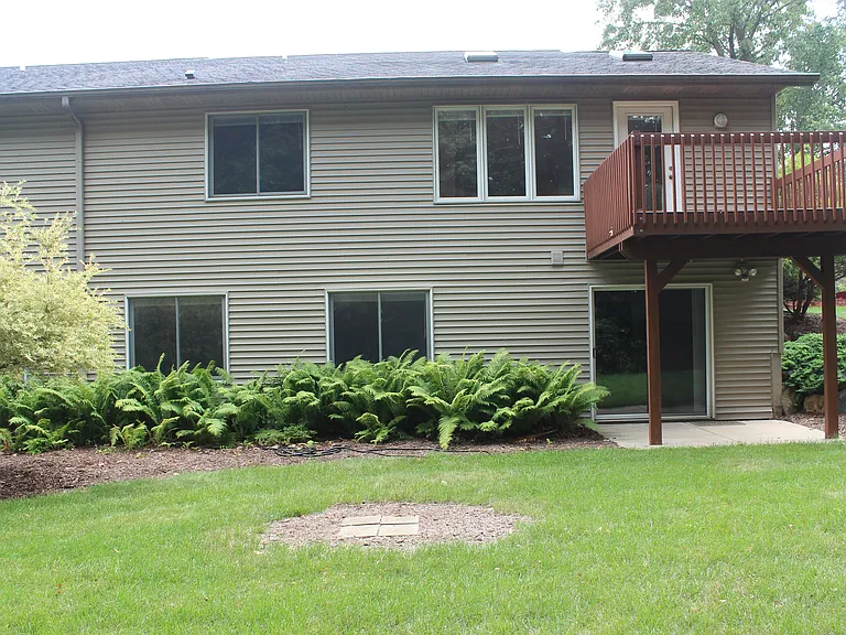 Back view of duplex and deck