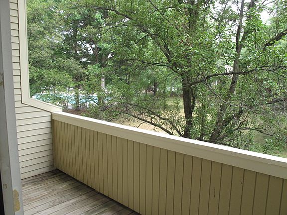 Spacious balcony facing quiet woods