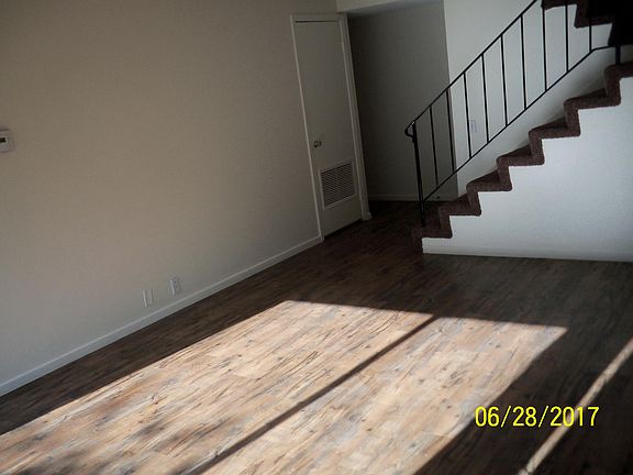 Living Room and hallway to laundry plus 1/2 bath