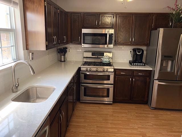 Updated Kitchen with SS Appliances, Self Cleaning Oven, Full Refrigerator & Dishwasher