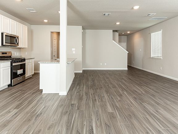 Dining Area to Kitchen and Family Room