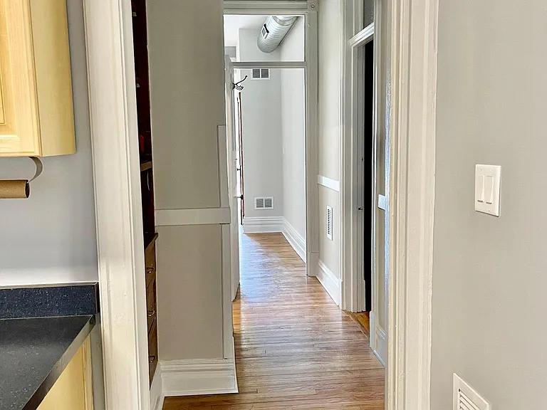 View down hallway from Kitchen