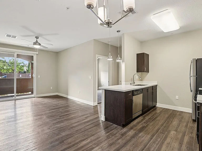 Kitchen and Bar Area with Pendant Lighting