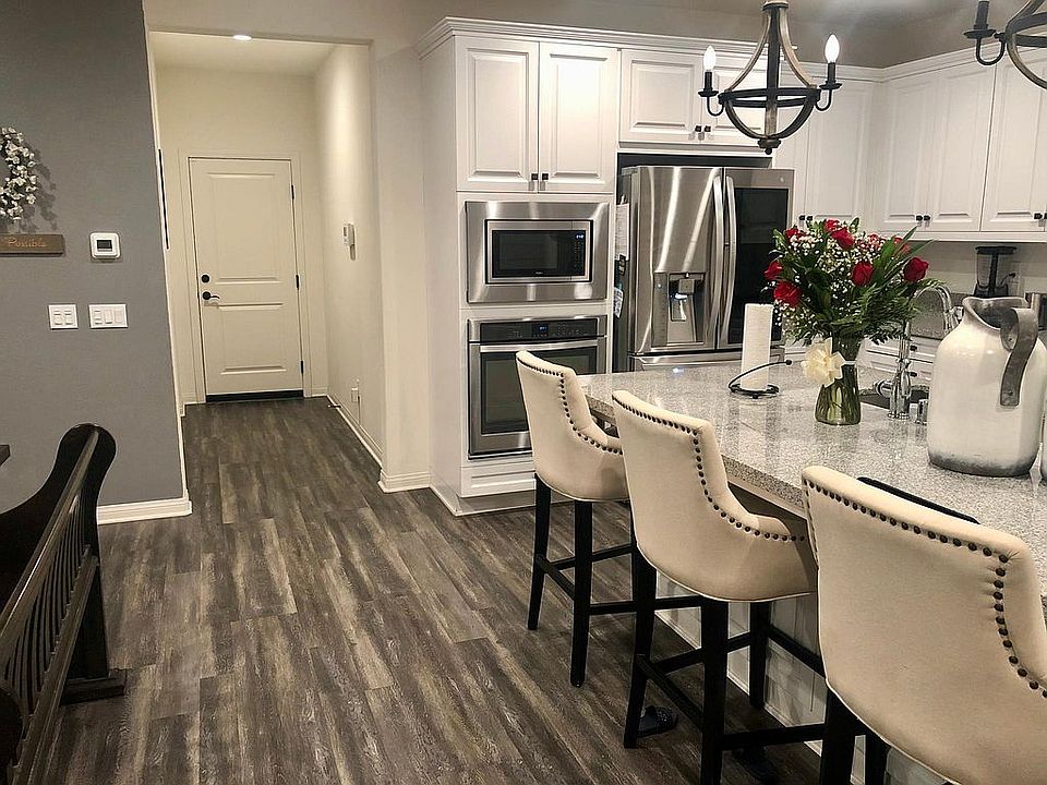 Garage Hallway Leads To Pantry & Spacious Kitchen.