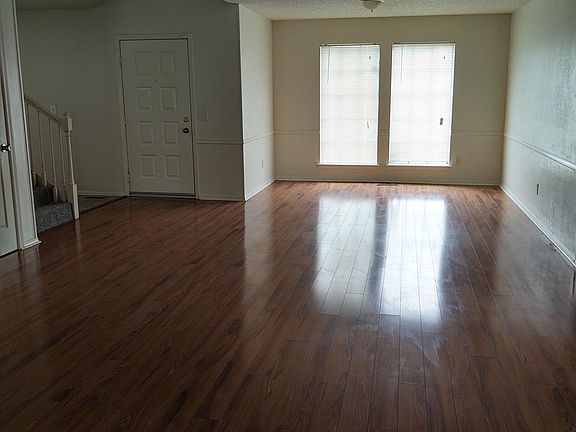 Living Room view towards front door and dining